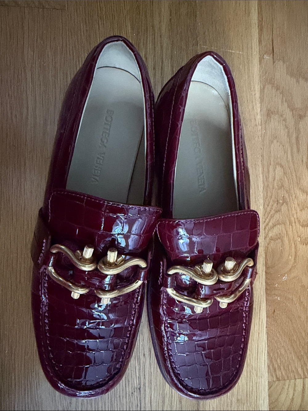 Bottega Veneta Women’s Croc-Embossed Burgundy Patent Loafers with Gold Hardware